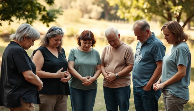 A small group standing in a circle with hands joined